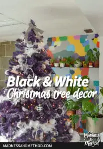 purple christmas tree with colourful background and black white ornaments