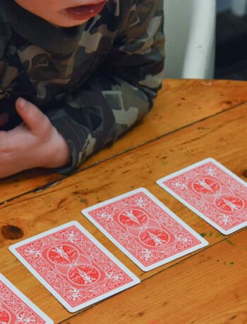 little kids playing cards