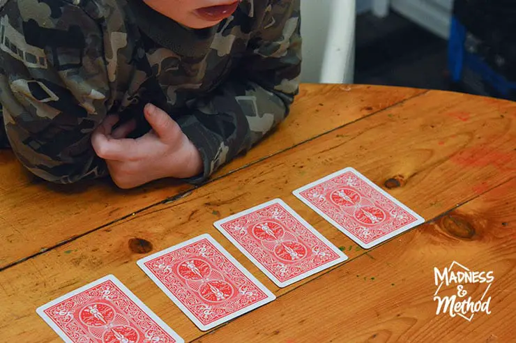 little kids playing cards