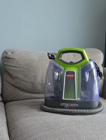 bissell little green pro heat on sofa