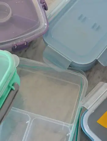 colourful plastic bento boxes on counter