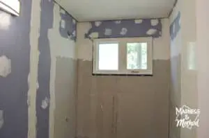cement board and water drywall in tub