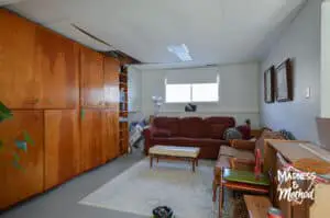 basement living room red sofa