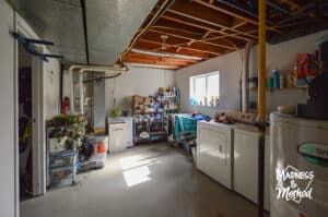 unfinished basement laundry room