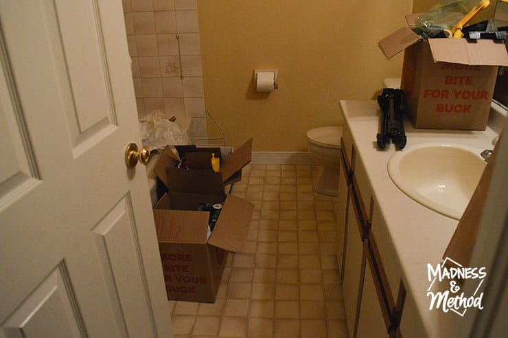 messy bathroom before renovation