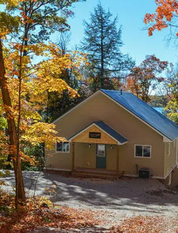 rocky retreat cottage with fall leaves