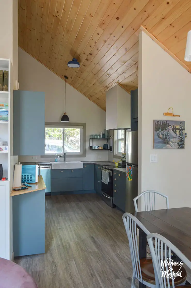 kitchen with wood ceiling and turquoise cabinets