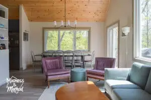 wood plank ceiling with dining and living room