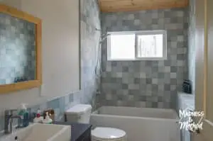 multi-coloured teal tile in bathroom