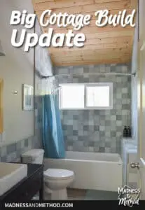 big cottage build update text overlay with bathroom