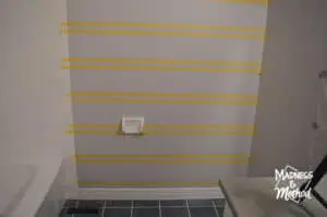 tape stripes on wall