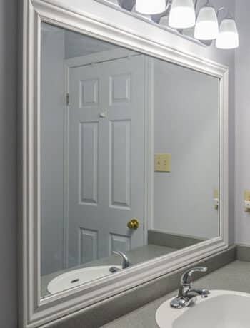 framed bathroom mirror