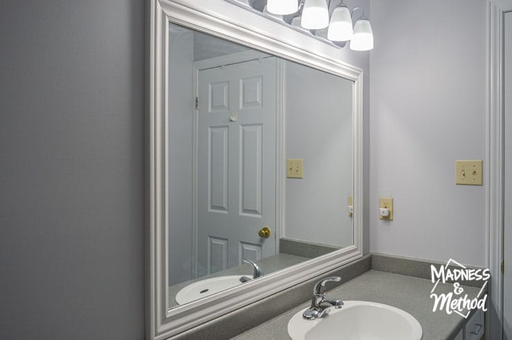 framed bathroom mirror