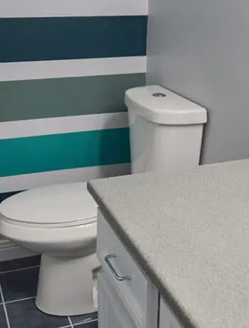 gray counters teal walls bathroom