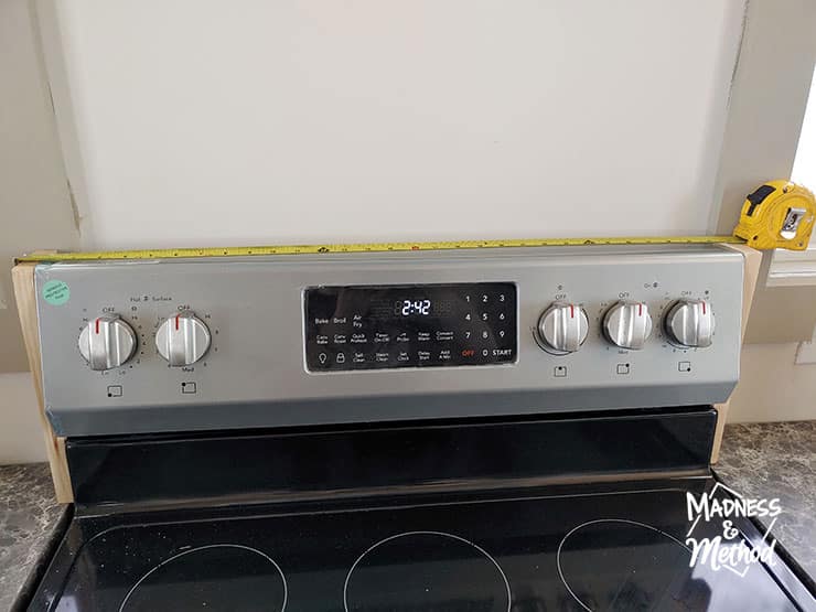 measuring shelf for over the stove
