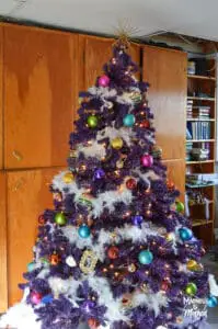 purple christmas tree with white garland