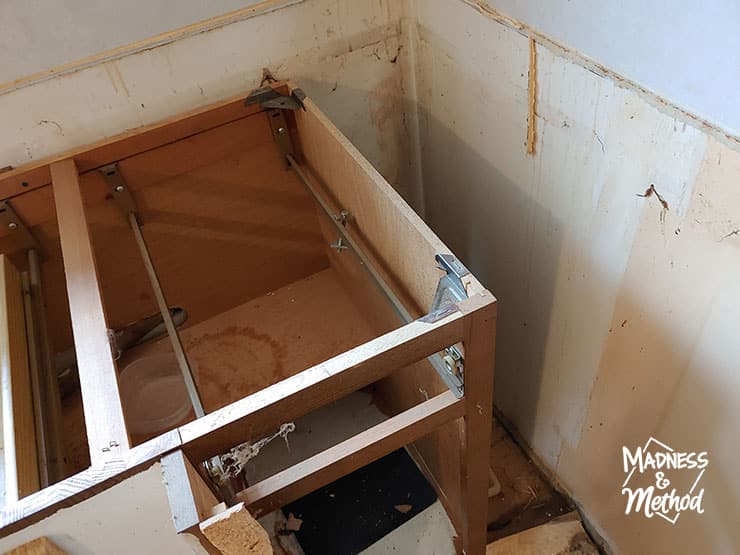 open space behind cabinets