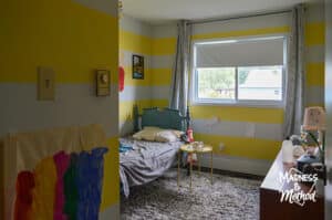 yellow white stripe bedroom