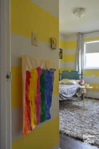 kids artwork taped to walls