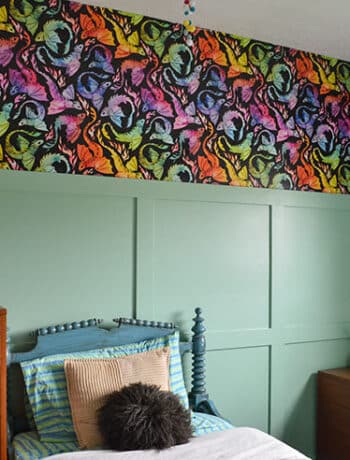 teal walls with dark wallpaper