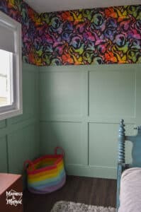 rainbow basket against teal walls