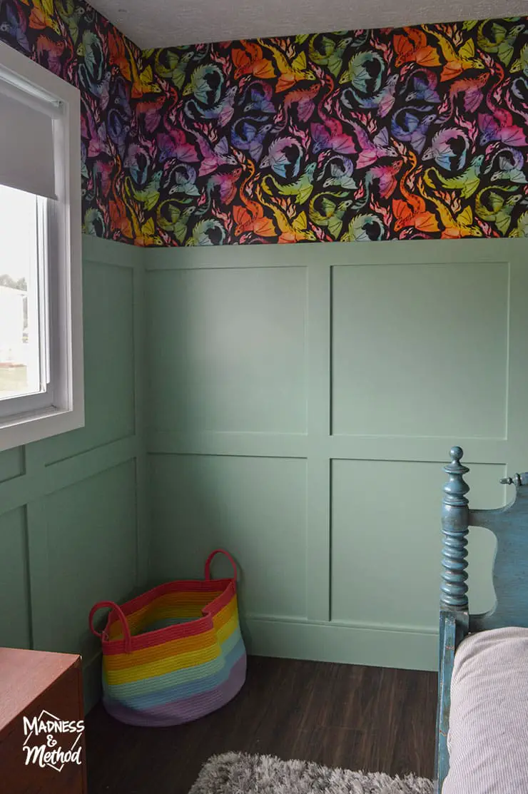rainbow basket against teal walls