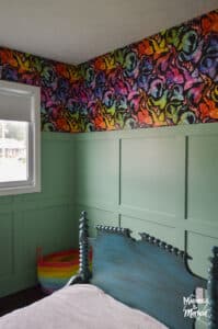 teal walls and rainbow wallpaper