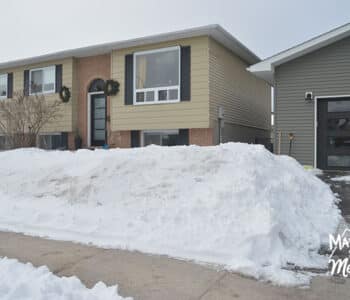 snowy raised ranch house