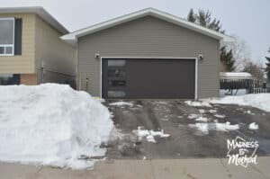 asphalt driveway with snow