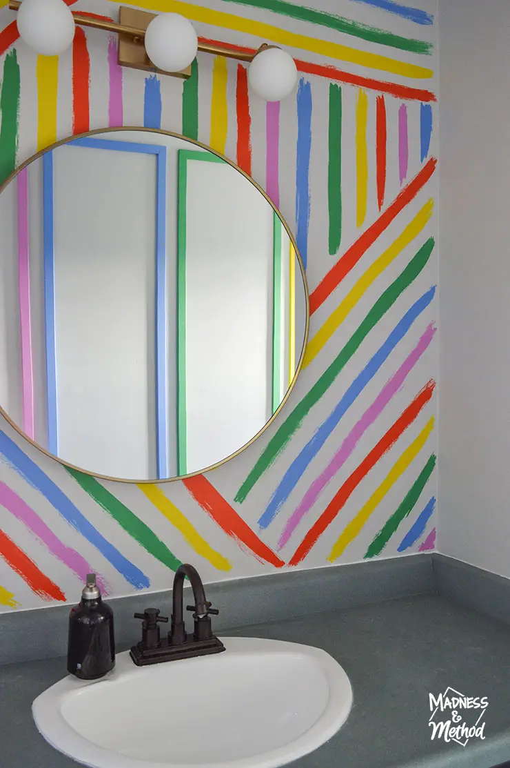 rainbow stripe wall in bathroom