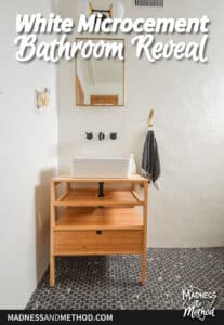 white microcement bathroom walls with wood vanity