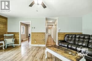living room entry with wood wainscoting