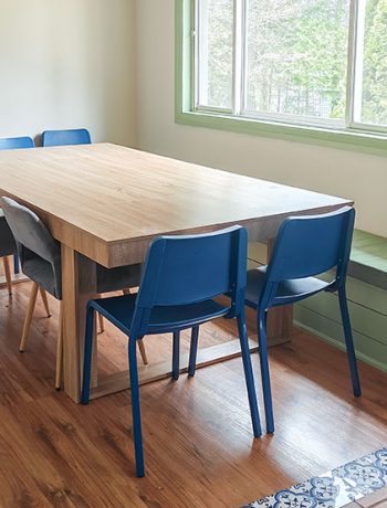 dining room with blue chairs